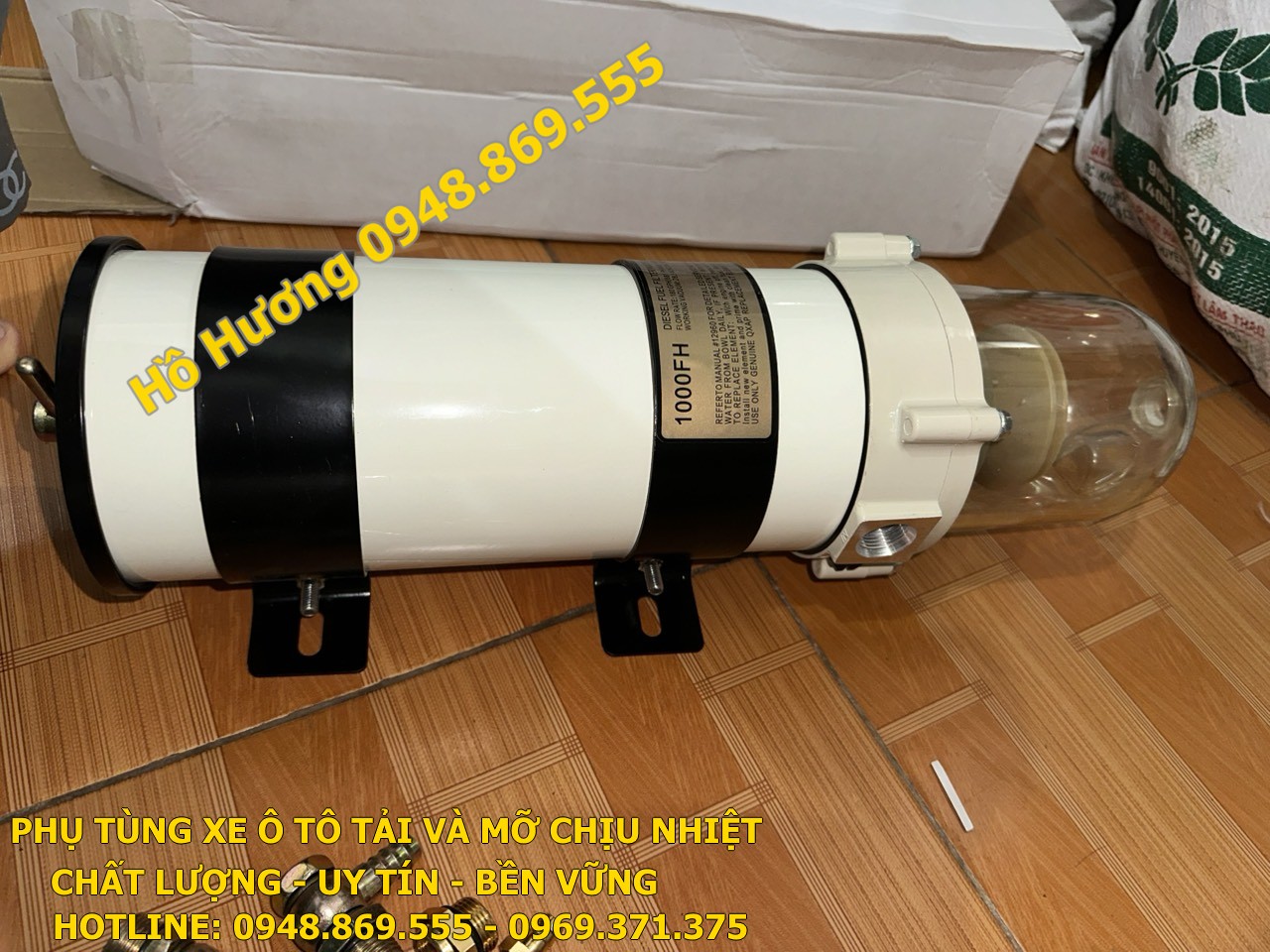bau loc tach dau nuoc may dien howo FG1000 (1)